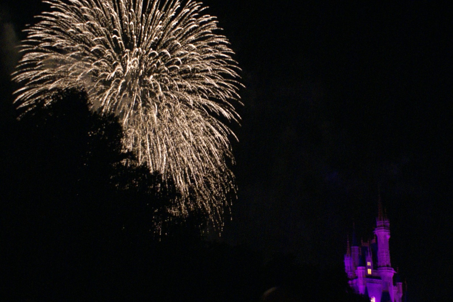 Fireworks explosion beyond castle